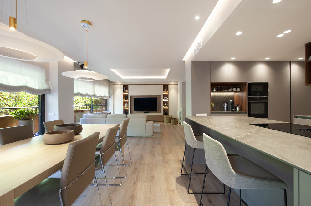 En los espacios abiertos la cocina adquiere protagonismo e integración En los espacios abiertos la cocina adquiere protagonismo e integración